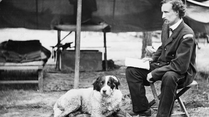 Lieutenant George Custer with his dog during the Peninsula Campain in 1862.