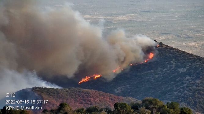 Part of the Contreras Fire burning on the slopes of the Kitt Peak mountain on Thursday evening of June 16, 2022. (Image credit: KPNO/NOIRLab/NSF/AURA)