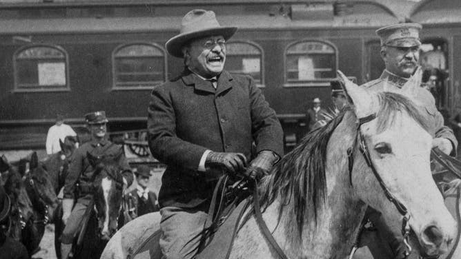President Theodore "Teddy" Roosevelt rides on horseback at Yellowstone National Park in 1903.