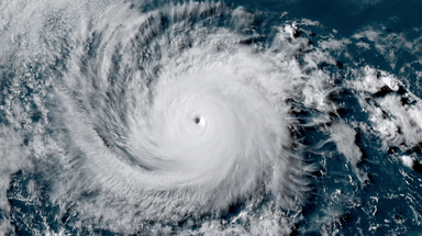 How do hurricanes and tropical storms get their names?