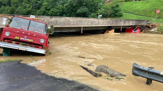 A firetruck was swept away by floodwaters in Hindman, Kentucky on July 28, 2022.