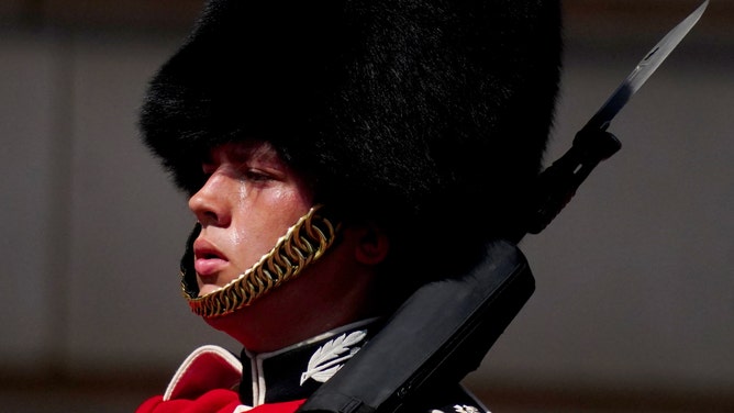 Guards swelters in the heat