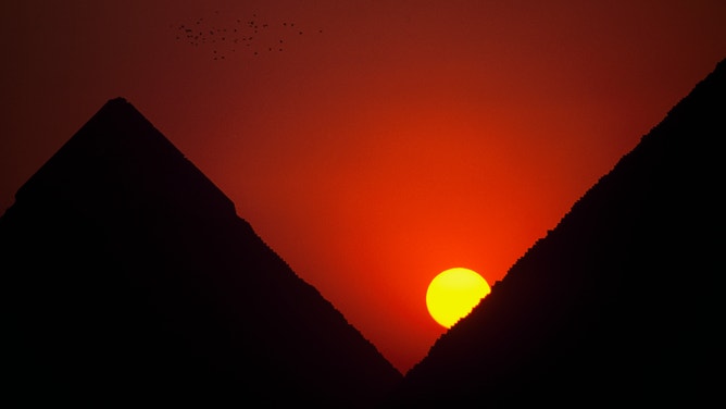 The Pyramids of Giza at sunset.