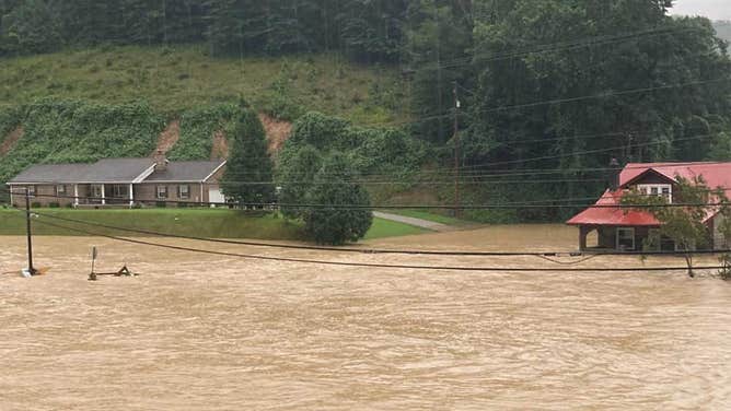Floodwaters moving across Hindman, Kentucky on July 28, 2022.