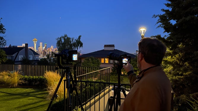 Tim Durkan awaits the arrival of the Full Buck Supermoon