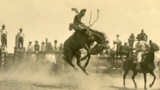 Cowboy Tex Crockett on horseback.