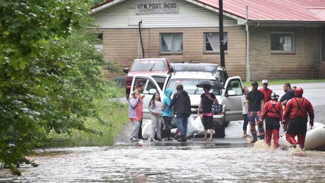 Images show the flooding conditions near Pound, Virginia and surrounding communities on July 28, 2022 where evacuations and water rescues were underway.