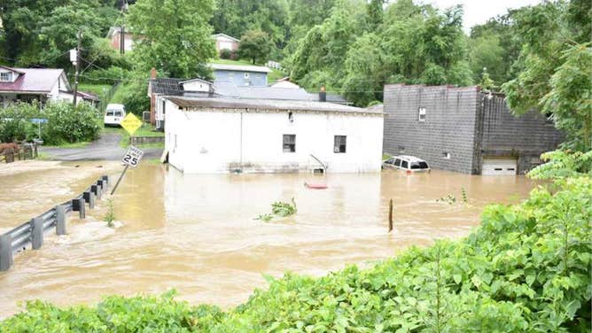 Images show the flooding conditions near Pound, Virginia and surrounding communities on July 28, 2022 where evacuations and water rescues were underway.