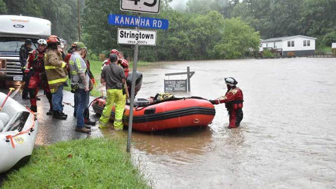 Images show the flooding conditions near Pound, Virginia and surrounding communities on July 28, 2022 where evacuations and water rescues were underway.
