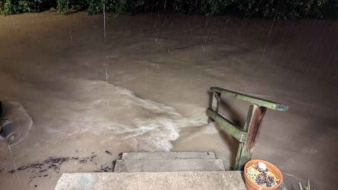Flooding in a St. Charles, Missouri backyard from record rainfall