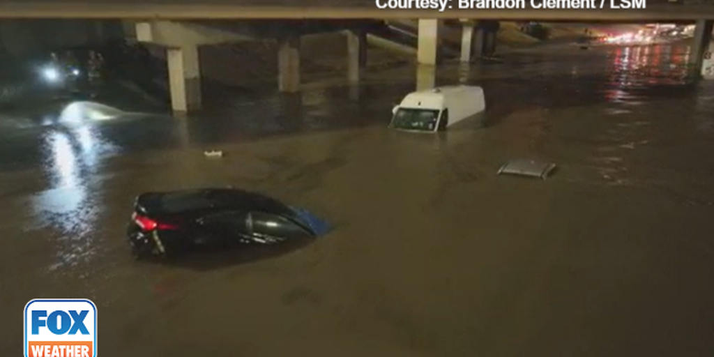 Incredible scenes of survival: Watch as 15-inches of rain leaves Dallas-Fort Worth underwater
