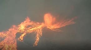 Watch: ‘Firenado’ swirls out from large brush fire in California