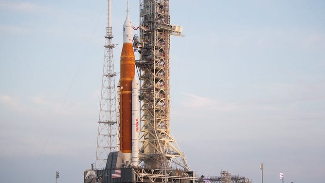 NASA’s Space Launch System (SLS) rocket with the Orion spacecraft aboard is seen at sunrise atop the mobile launcher as it arrives at Launch Pad 39B, Wednesday, Aug. 17, 2022, at NASA’s Kennedy Space Center in Florida. NASA’s Artemis I flight test is the first integrated test of the agency’s deep space exploration systems: the Orion spacecraft, SLS rocket, and supporting ground systems. Launch of the uncrewed flight test is targeted for no earlier than Aug. 29.
