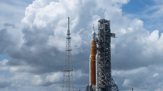 NASA’s Space Launch System (SLS) rocket with the Orion spacecraft aboard is seen atop the mobile launcher at Launch Pad 39B, Tuesday, Aug. 30, 2022, at NASA’s Kennedy Space Center in Florida. NASA’s Artemis I flight test is the first integrated test of the agency’s deep space exploration systems: the Orion spacecraft, SLS rocket, and supporting ground systems