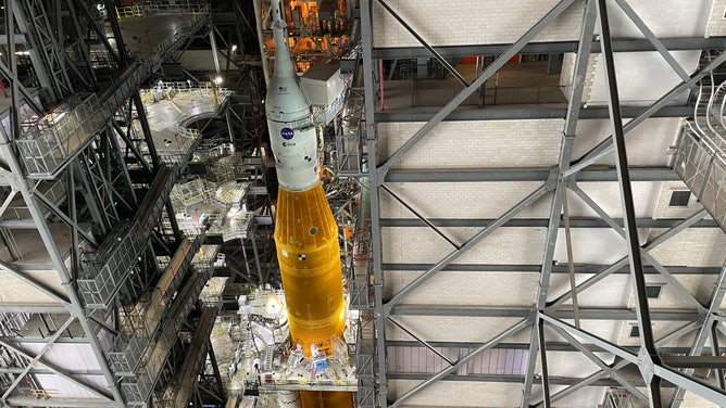 NASA's Space Launch System and Orion spacecraft seen inside the Vehicle Assembly Building at Kennedy Space Center in Florida.