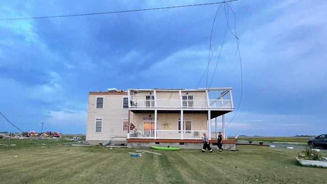 Damage is seen on Smith Island, Maryland, after a waterspout crashed ashore as a tornado on Thursday, Aug. 4, 2022.