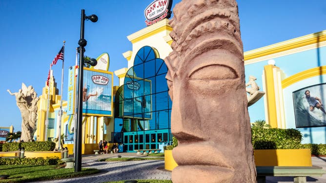 Florida, Cocoa Beach, Ron Jon Surf Shop with Tiki Head Sculpture.