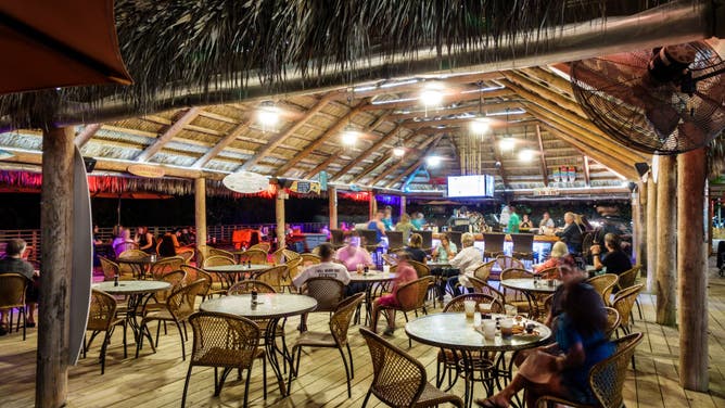 Florida, Hilton Cocoa Beach Resort, LongBoards Tiki Beach Grille at Night.