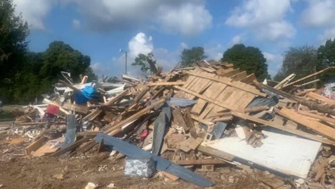 Sanders's home, after the flood.