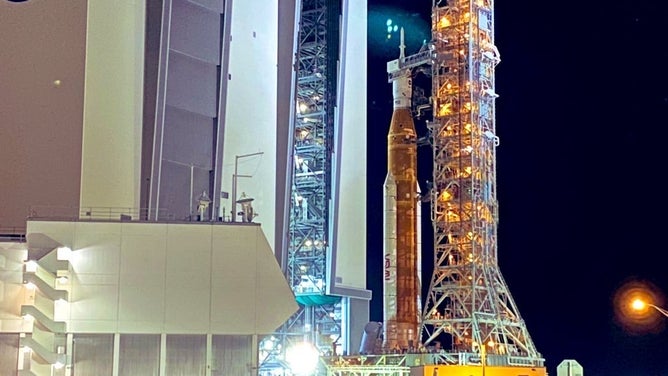 NASA's SLS rocket and Orion spacecraft leave the Kennedy Space Center Vehicle Assembly Building on Aug. 16, 2022. The Artemis-1 rocket was moved to launchpad 39B ahead of the late August launch to the moon.