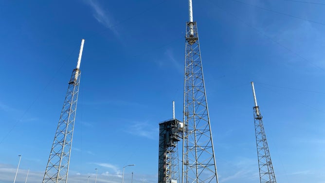 Four towers and wires part of the lightning protection system are seen around Launch Complex 41 where ULA launches the Atlas V rocket.