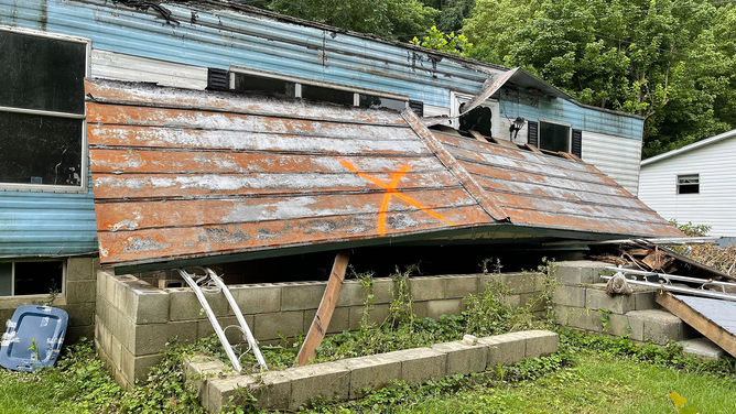 Debris litters the landscape in eastern Kentucky after devastating flooding last week.
