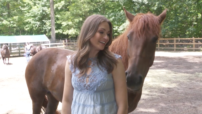 Merwin with one of the horses at the Unbridled Heroes Project.