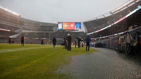 Heavy rain floods Soldier Field during Chicago Bears' season opener against San Francisco 49ers