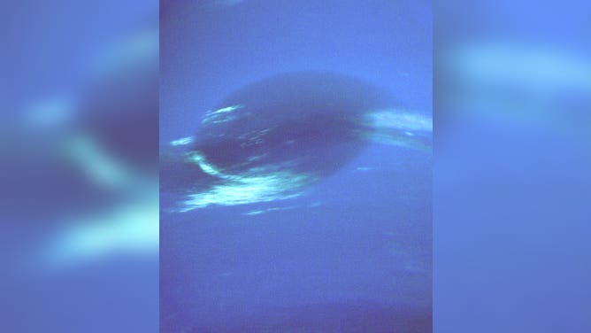 Neptune's Great Dark Spot as seen by Voyager 2.