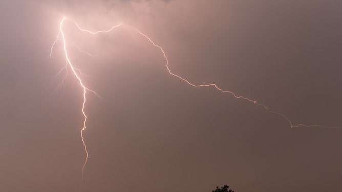 Dry lightning obscured by smoke