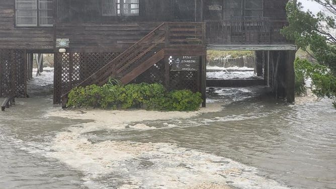 Tidal surge has lived up to the predictions. Here is the view from Springs Ave. in Pawleys Island, South Carolina.