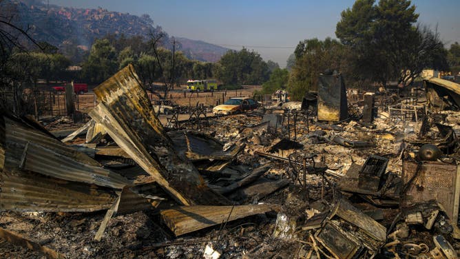 A structure on Gibble Road destroyed in brush fire Fairview Fire that is still raging in Avery Canyon on Tuesday, Sept. 6, 2022 in Hemet, CA.
