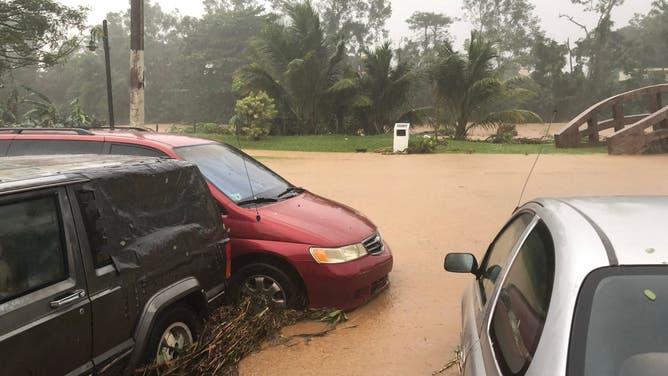 A flooded road is seen during the passage of hurricane Fiona in Villa Blanca, Puerto Rico, on September 18, 2022.