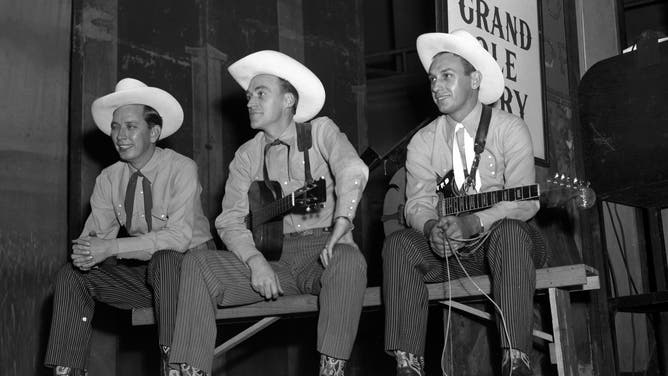 A view of country singer-songwriter Ernest Tubb's backup players, the Texas Troubadours, backstage at the Grand Ole Opry in Nashville, Tennessee.  Around 1951.