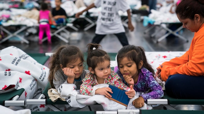 People seek shelter from Hurricane Harvey at the George R. Brown Convention Center in Houston, TX on Monday, Aug 28, 2017.