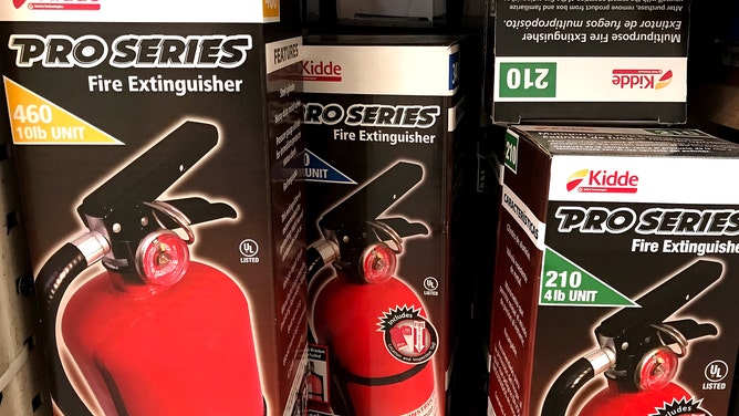 Fire extinguishers for sale at a store.