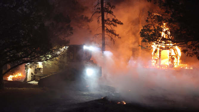 A structure burns from the Mill and Mountain fires in northern California on Sept. 2, 2022. (Image: CAL Fire)