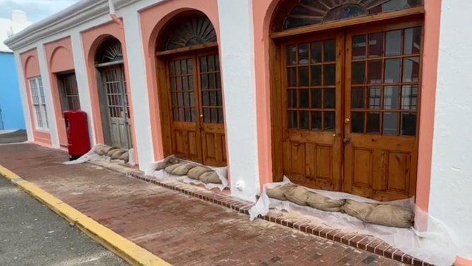 Sandbags lay at the doorstep of a building in St. George's, Bermuda.