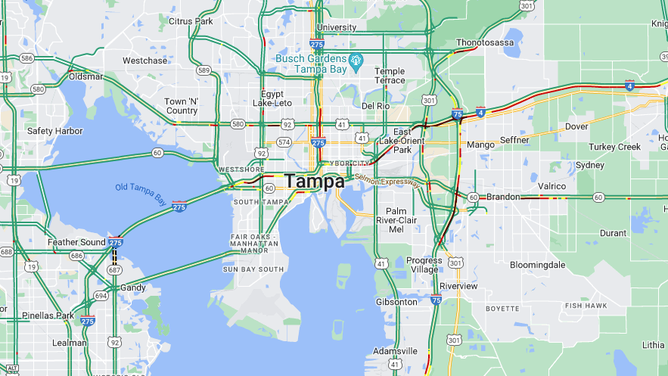 Dark red lines indicate slow traffic around Tampa Bay.