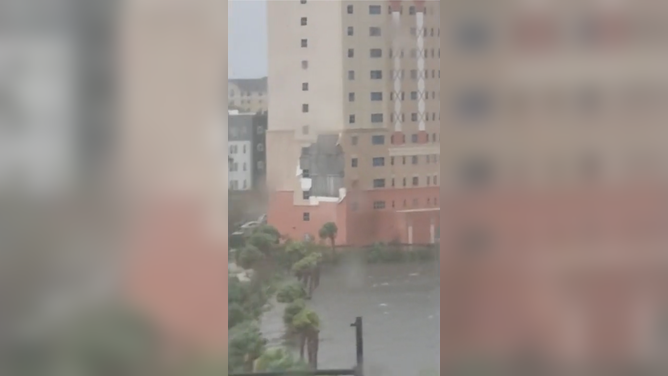 Part of Holidaymakers, a Universal Orlando hotel, was peeled off during Hurricane Ian.