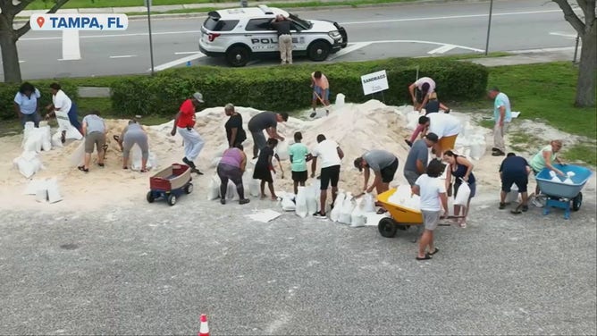 Sandbags are being filled in Tampa in preparation for possible flooding due to Hurricane Ian.