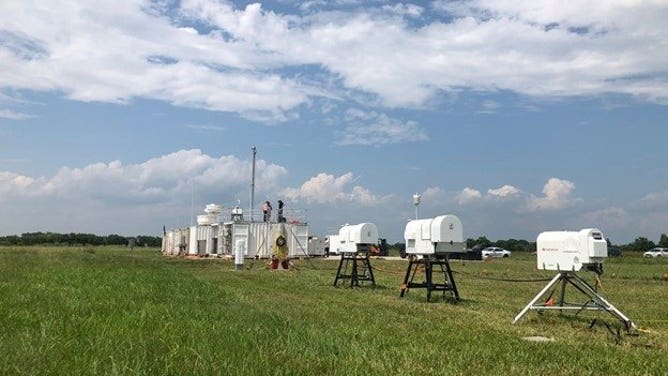 Clouds over the Department of Energy Atmospheric Radiation Measurement mobile user facility in La Porte, Texas, as researchers set up equipment for the TRacking Aerosol Convections interactions ExpeRiment (TRACER).