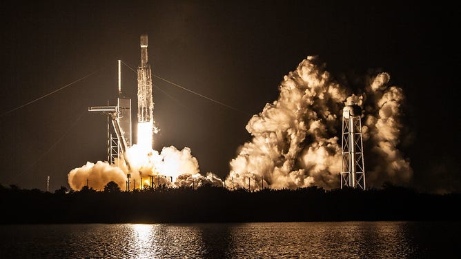 A SpaceX Falcon Heavy rocket launching the STP-2 mission in June 2019 from Kennedy Space Center in Florida.