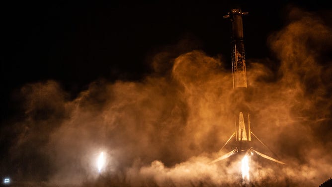 One of three SpaceX Falcon Heavy rocket boosters landing after launching the STP-2 mission in June 2019 from Kennedy Space Center in Florida.