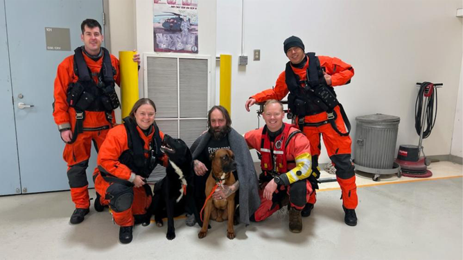 Shown include the Coast Guard Air Station Sitka aircrew who rescued Robert Johnson and his two dogs after Johnson's vessel capsized in Freshwater Bay, Alaska, Oct. 19, 2022. Johnson signaled the aircrew with a flare, who quickly located him nearby on shore.