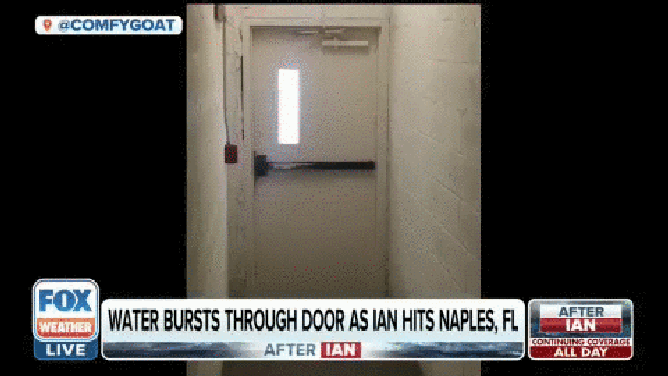 Water bursts through door in Naples during Hurricane Ian
