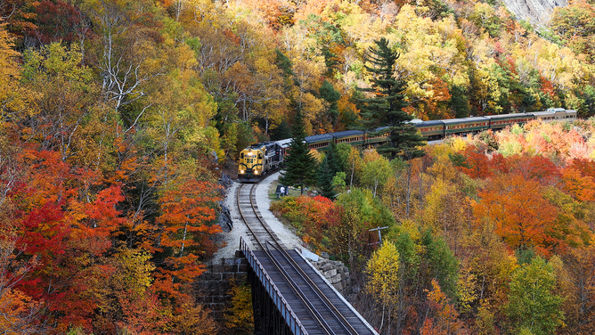 NEW HAMPSHIRE, USA - OCTOBER 12: Scenic Railroad is seen with a historic train during colorful fall foliage in New Hampshire, United States on October 12, 2021. (Photo by Tayfun Coskun/Anadolu Agency via Getty Images)