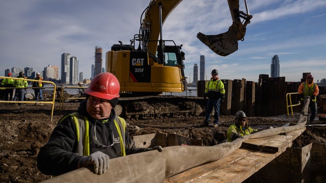 A general view shows construction workers at the site of a flood defense project on the east side of Manhattan, New York City.