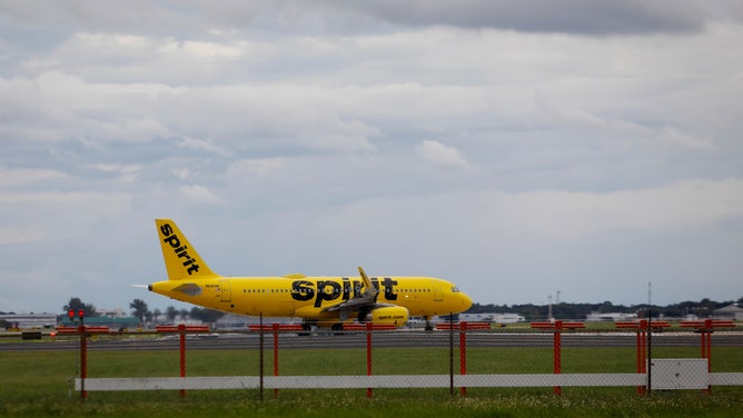 A Spirit Airlines airplane taxis at Tampa International Airport (TPA) ahead of Hurricane Ian in Tampa, Florida, US, on Tuesday, Sept. 27, 2022.