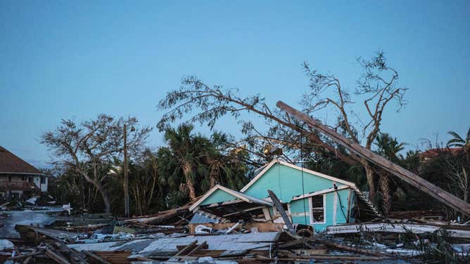 A destroyed beach front home that was carried across the street by the storm surge. Scenes of flooding and storm damage after Hurricane Ian ravaged Fort Myers Beach, Fla.
